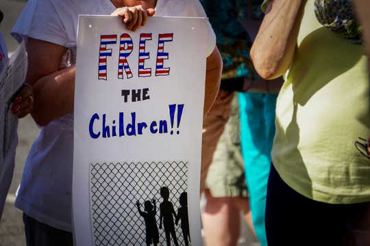 On June 14, 2018: A protester at a Keep Families Together rally in Detroit, Michigan (What damage are we doing to our children and ourselves?)